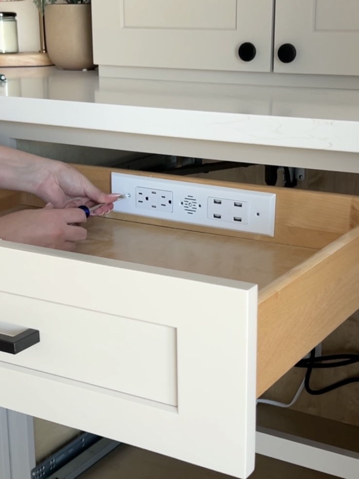 Docking drawer installation screw on face plate outlet cover